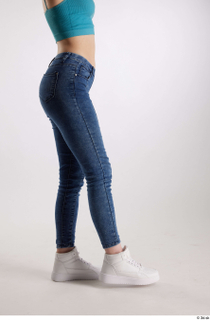 Rada  1 blue jeans casual dressed flexing leg side…